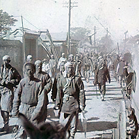 A historic photograph of Boxer fighters
