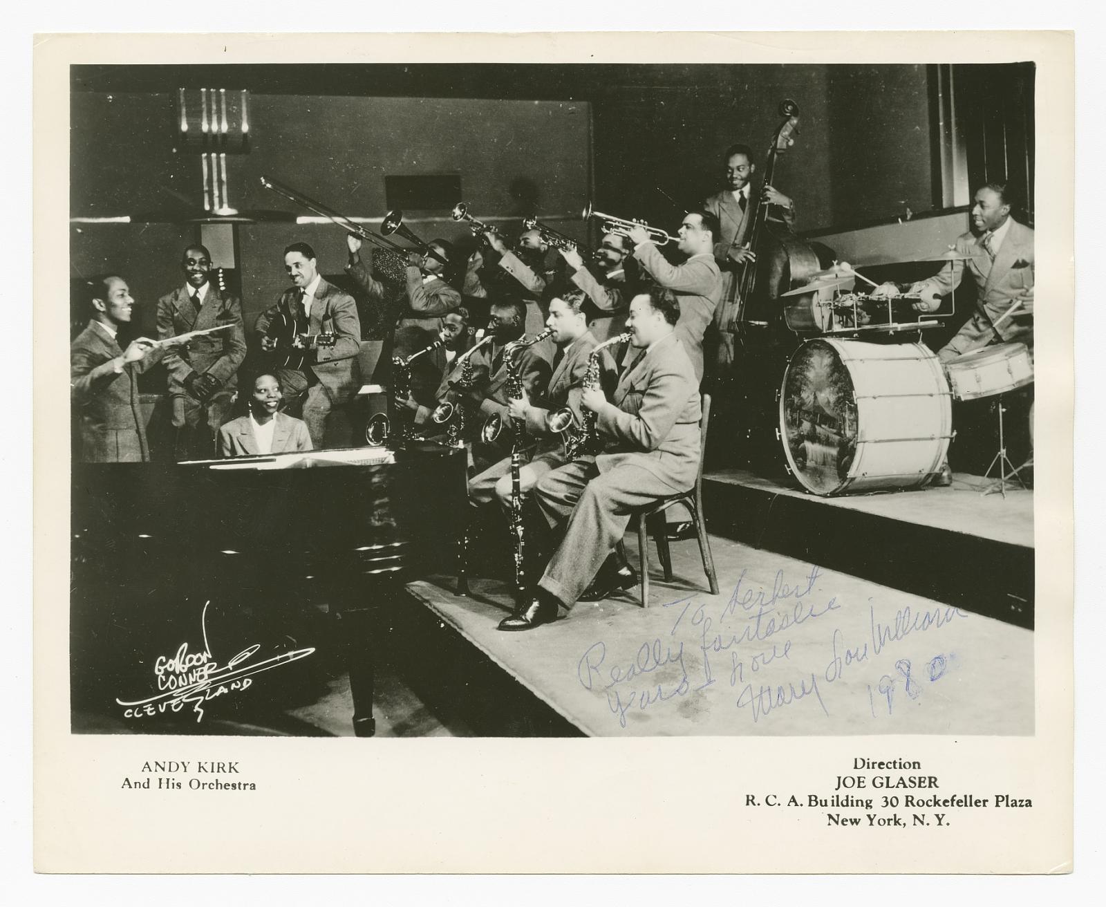 Photograph of Mary Lou Williams playing piano with Andy Kirk and his orchestra