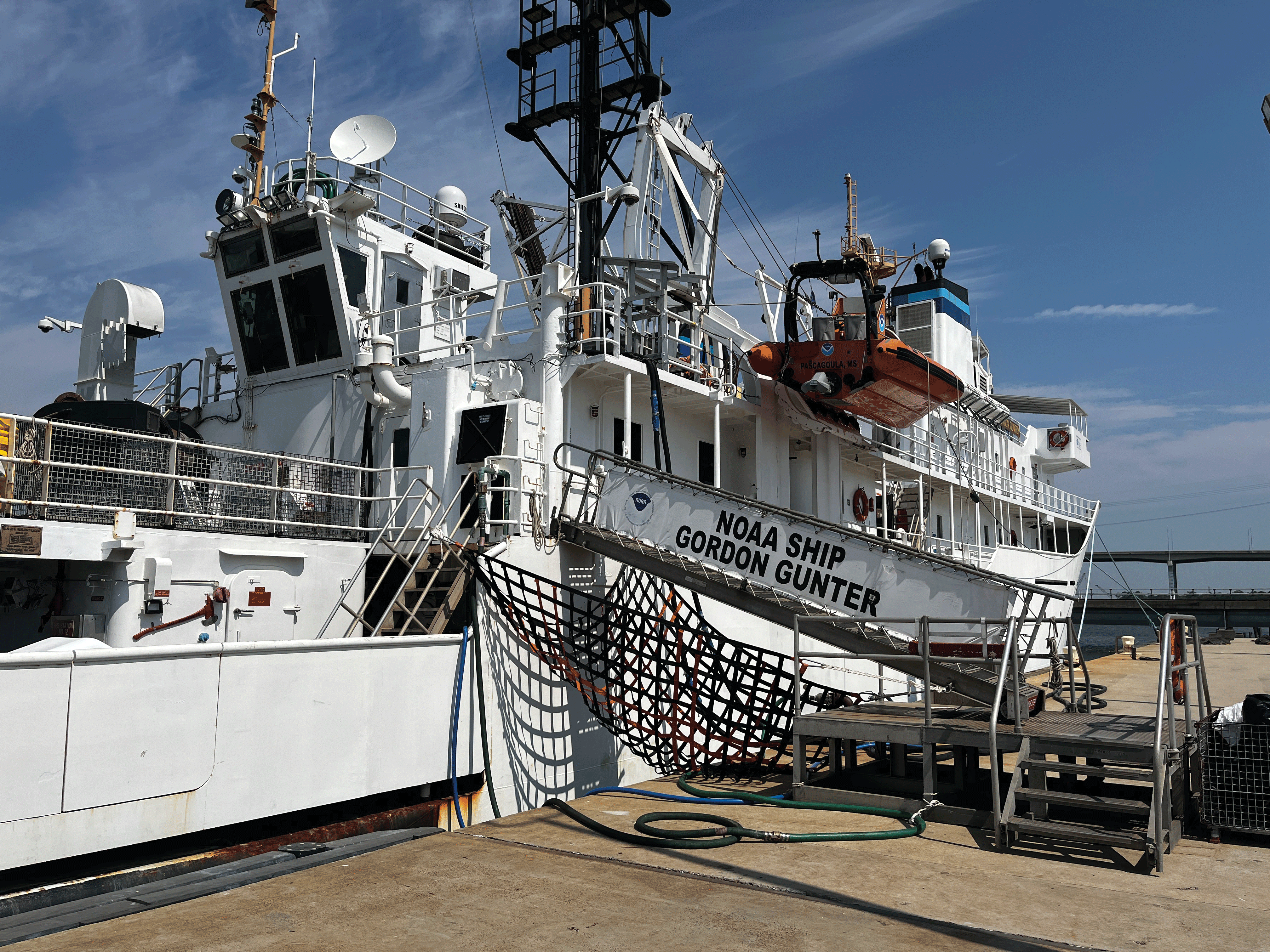 A NOAA research ship with a radar on its top deck