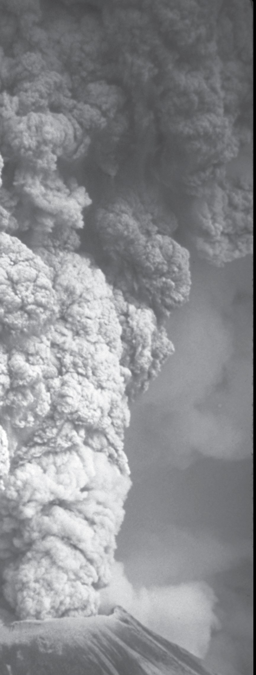 A towering, billowing column of ash rising from the volcano.