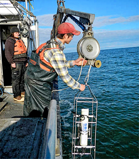 A CTD instrument being deployed from a fishing vessel