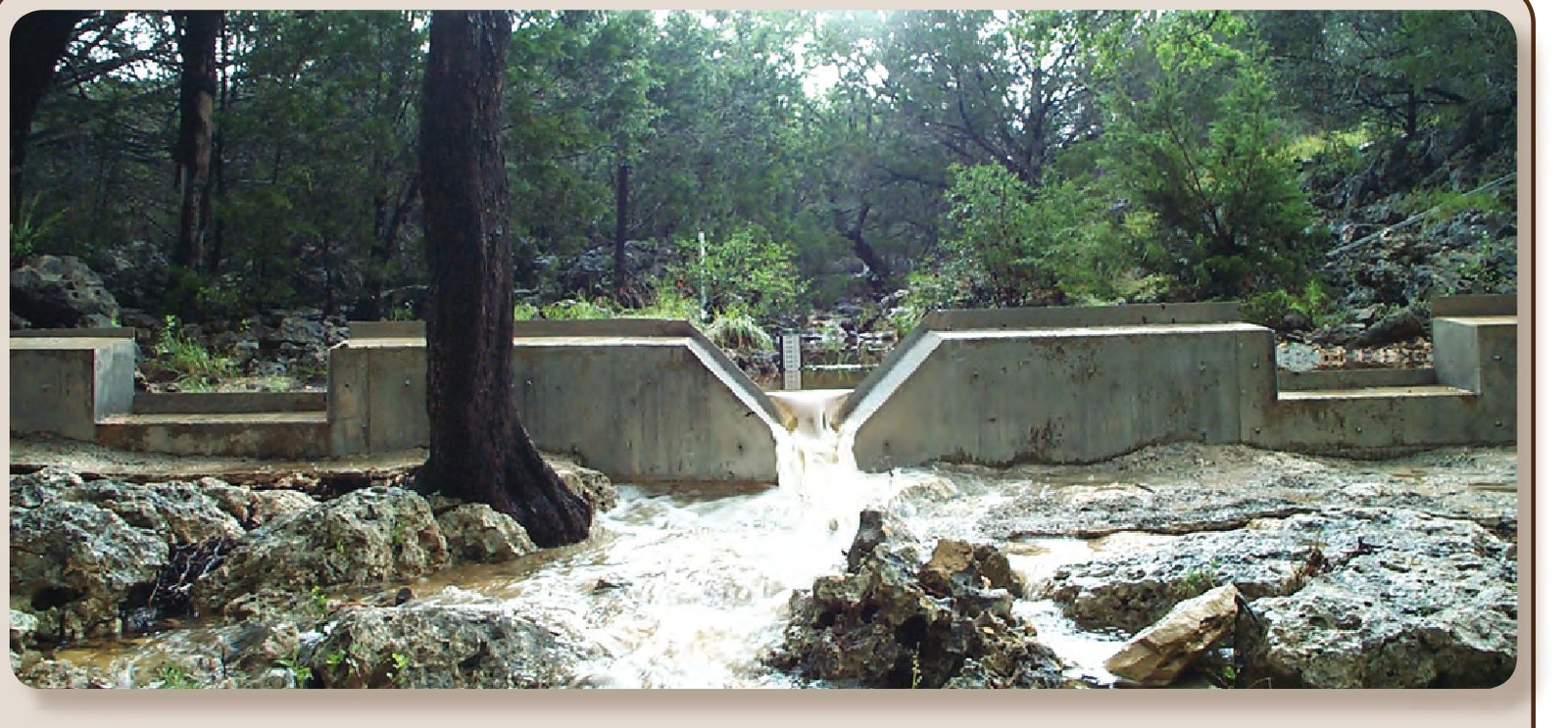 Streamflow-gaging stations were installed in the study area, such as this weir in the treatment watershed at site 2T (U.S. Geological Survey station 08167353 Unnamed tributary of H