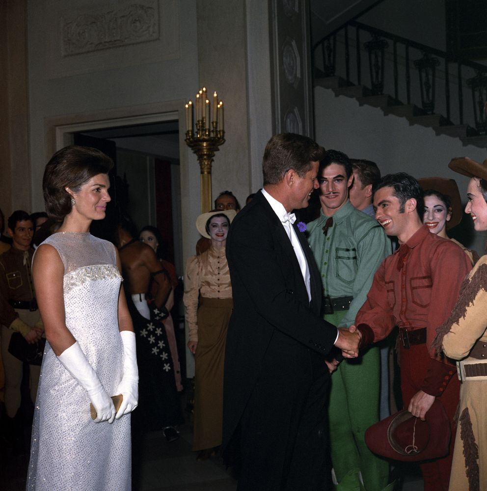 President John F. Kennedy and First Lady Jacqueline Kennedy visit with members of the American Ballet Theatre, 22 May 1962. (John F. Kennedy Presidential Library and Museum, National Archives)