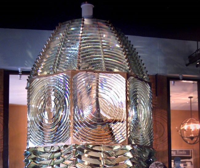 A large first-order Fresnel lens on display.