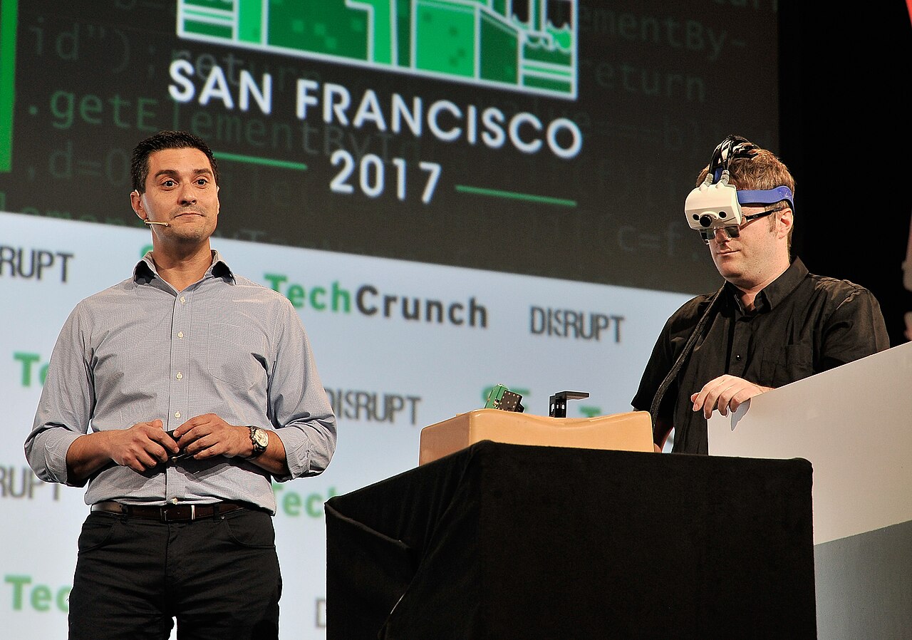 Augmedics displaying their xvision headset at a technical conference in 2017.