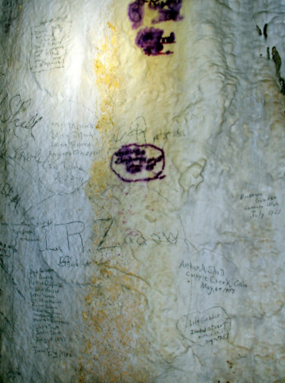 Signatures crowded on the wall of the Talus Room