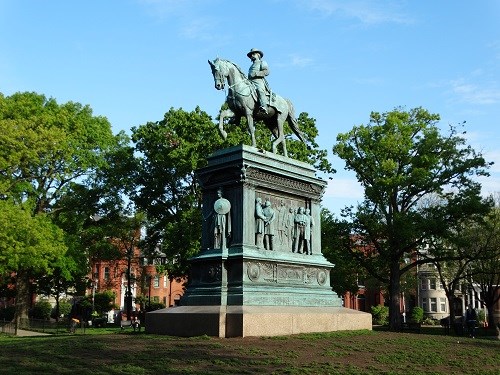 Equestrian statue of General John Logan on a pedestal in Logan Circle.