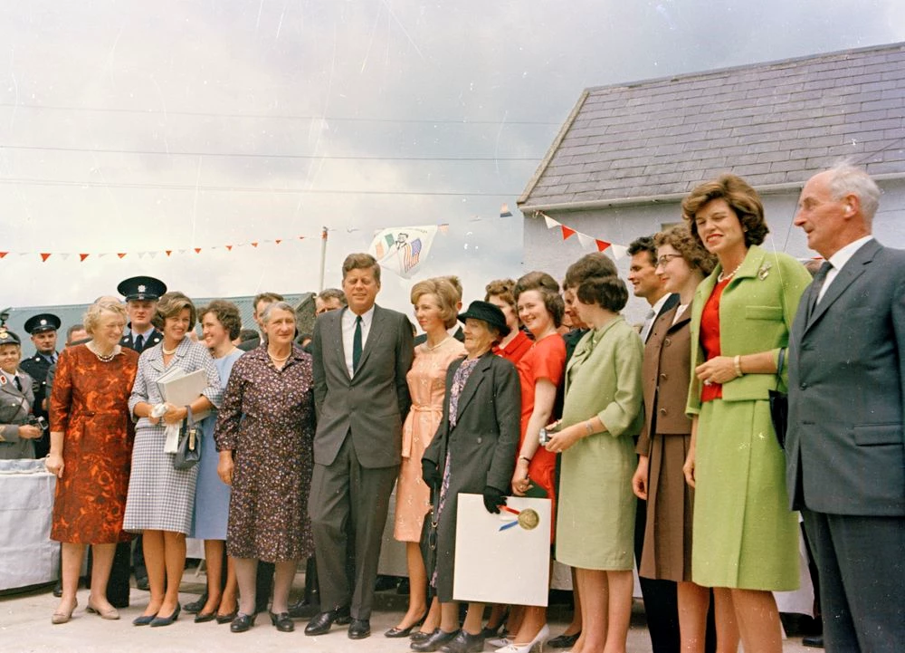 President Kennedy with his sisters and relatives outside the Kennedy Homestead in Ireland.