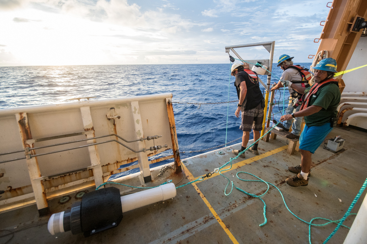 Scientists on deck with the first recovered drifting recorder