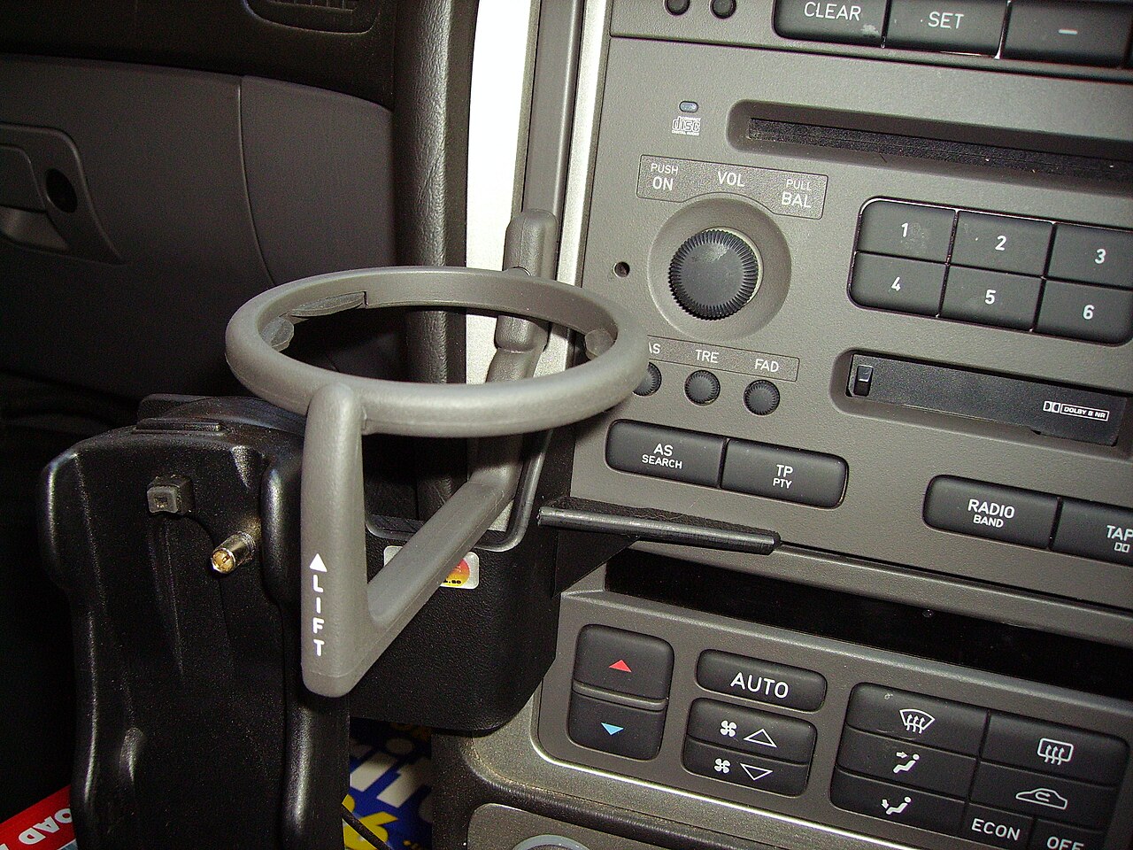 retractable cup holder in a Saab 9-5.