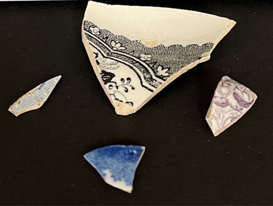 Pieces of ceramics on a black background