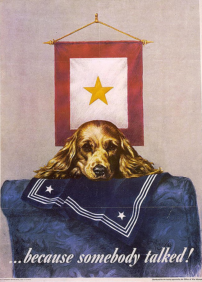 A sad cocker spaniel rests its head on a chair draped with a US Navy uniform, beneath a banner with a gold star.