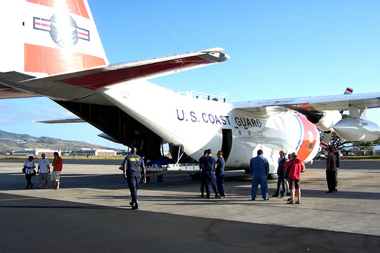 A Coast Guard airplane used to move a monk seal